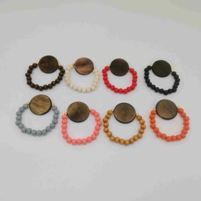 China Beads Bracelet with Disc Fashion Wooden Beads Bracelet with Disc Monogram Beads Bracelet Elastic Engraved Bracelet for sale