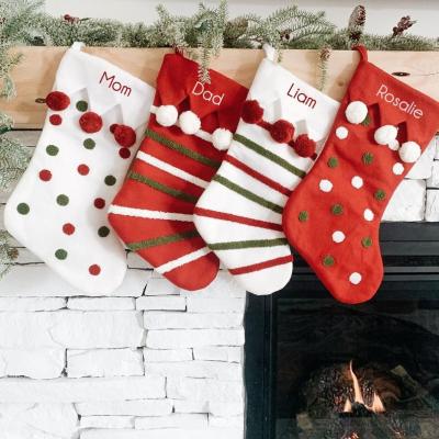 China Bulk Christamas Decoration Personalized Newcomer Pompom Christmas Stocking The Red Plush Christmas Decoration Gift Bag for sale