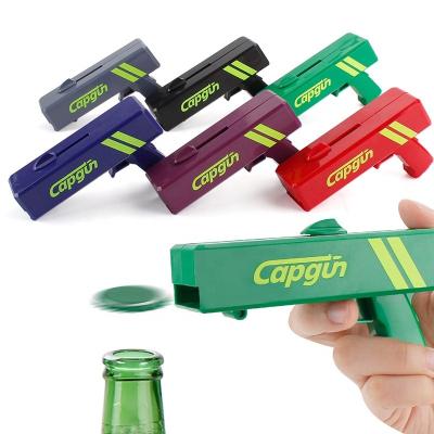 China Custom Made ABS Bottle Opener Party Game GUN Beer Bottle Opener Cover Shooting Plastic Bottle Opener Viable Dropshipping Logo Design for sale