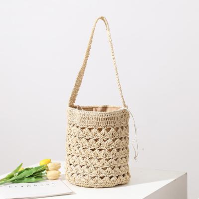 China 2021 New Eco-friendly Straw Shoulder Bag Fashion Tassel Beach Straw Bag Handwoven Holiday for sale