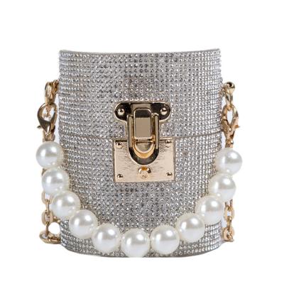 China 2021new design diamond mini purse girl crystal bag high quality pearl cylinder chain bag for sale