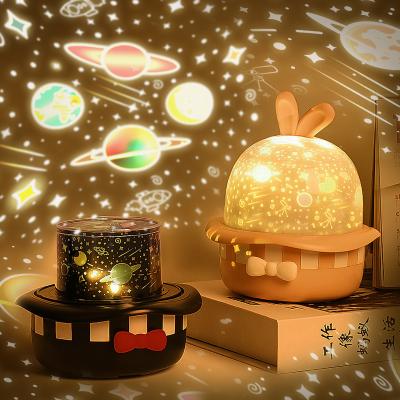 China Modern Rabbit Shaped Night Light Projector Light Colors Rechargeable Rotating Led Multiple Projection Lamp With Remote for sale