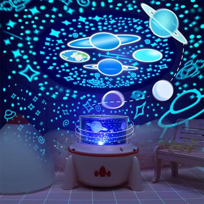 China Eco-friendly Remote Background Radio Music Baby Rocket Projection Lamp Led With Control Starry Night Star Projector for sale