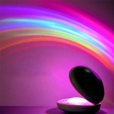 China Modern Amazing Magic Rainbow Shell Shape USB LED Rechargeable Night Light Projector for Kids for sale