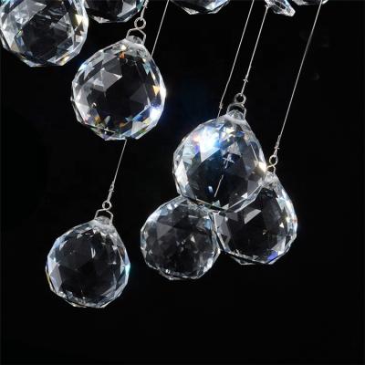 China Modern Long Hanging Stairs Crystal Raindrop Chandelier High Quality Modern Manufacturers for sale