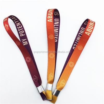 China Promotion Gogopromotions customized polyester novelty material fabric wristband with hard plastic chip for sale