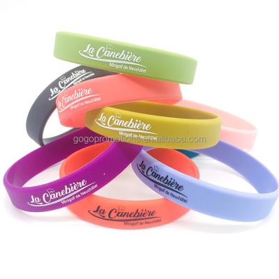 China Cheapest custom print printed debossed logo text color size glowing in dark silicone wristband for sale