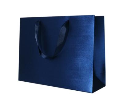 China Wholesale Cheap Price Luxury Famous Brand Gifts Recyclable Custom Printed Shopping Paper Bags With Your Own Logo for sale