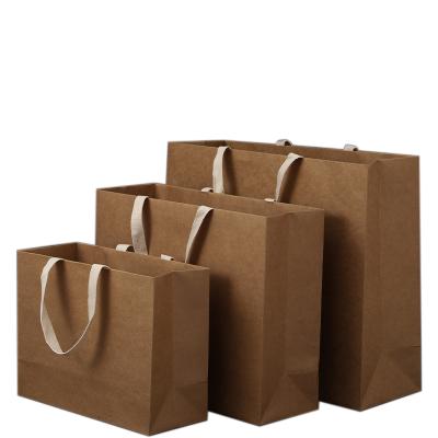 China Recyclable Wholesale Custom Brown White Gift Craft Kraft Paper Shopping Bag With Handle for sale