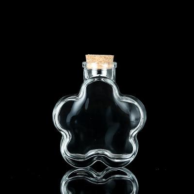 China Gift clear glass bottle with cork for decoration for sale