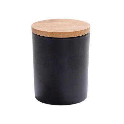 China Home Wholesale Custom Round Glass Candle Jar With Wooden/Metal Lids, Clear And Black Frosted Glass Jars Wide Mouth Candle Container for sale