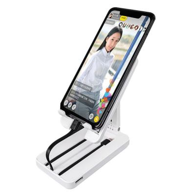 China Adjustable mobile phone rechargeable stand portable and easy to store mobile phone multi-function stand multi-function charging bank for sale