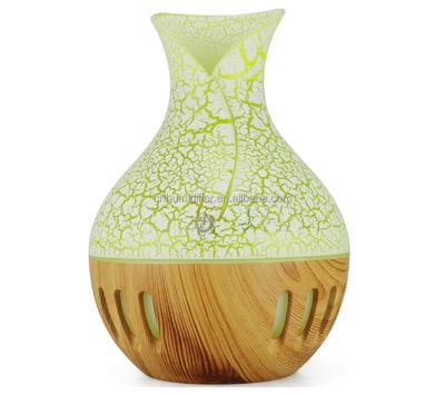 China 7colors LED Light Bestselling Slot Grain Vase Humidifier Oil Diffuser Aroma Diffuser 130ml Wood Ultrasonic Grain Mini Humidifier for sale