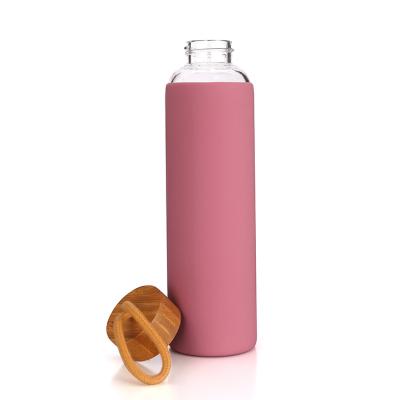 China Sustainable Wholesale Silicone Bamboo Sleeve Lids Promotion Glass Water Bottle For Drinking for sale