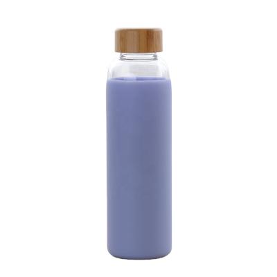 China 500ml Silicone Sustainable Sleeve Drinking Glass Eco Friendly Glass Water Bottle With Logo for sale