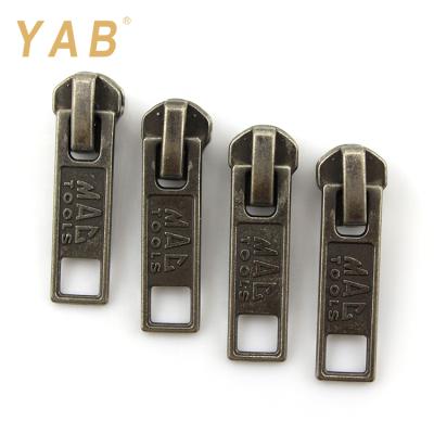 China YAB Luxury Goods Logo Jeans Reversible Painted Metal Nickel Free Customized Zipper Slider for sale