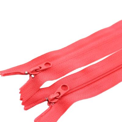 China YAB Viable Wholesale Hot Selling Garment Accessories Nylon Red Clogged Zippers For Garment And Home Textile for sale