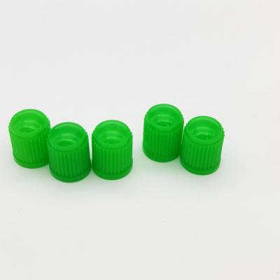 China Plastic Green Tire Valve Stem Dust Universal Covers Plastic For Most Tire Valves TR413 TR414 And More for sale