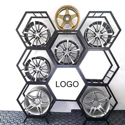 China Modern MDF Wood Display Metal Alloy Car Rim Holder Display Wheel Hub Wheel Rim Car Accessories Display Rack for sale