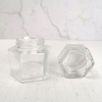 China Honey Jam Packaging Jar 30ml 80ml Small Hexagonal Jars Glass Jars For Gift Package Sample Honey Glass Jars With Cap for sale