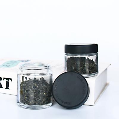 China Viable Child Safe Glass Jar 1oz 2oz 4oz Herb Storage Glass Jar for Skin Care Packaging for sale