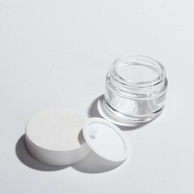 China Luxury Glass Skin Care Cream Jars Cosmetic Bottles With Black Plastic And Aluminum Cap Use For Eye Cream for sale