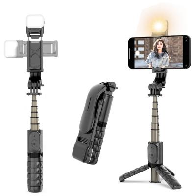 China Q10s Mini Portable Flexible 4-in-1 Selfie Stick Tripod Mobile Phone 360 ​​Degree Rotation With Wireless Remote Control LED Shutter Lamp for sale