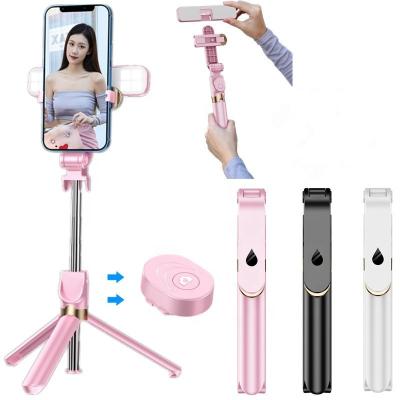 China Xt06s Foldable Tripod Selfie Stick Wireless Shutter 360 Degree Rotation Dual LED Mobile Phone Bracket Connection Light for sale