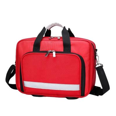 China Nylon Portable Professional First Aid Bag High Capacity Empty Bag With Shoulder Strap for sale