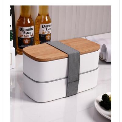 China Microwavable Eco-Friendly Plastic Leakproof 2 Layer Bento Lunch Box With Bamboo Lid for sale