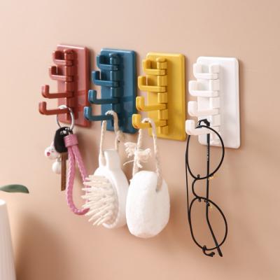 China 4 punch-free cheap plastic wall mounted stored in 1 creative revolving hook for sale