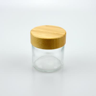 China 1oz 2oz 3oz 4oz cosmetic cosmetic glass jar with bamboo screw lid for sale