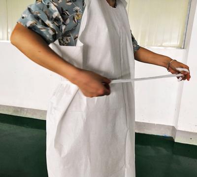 China Beauty Medical Clinic Examination Gown Disposable Paper Gown For Health Care for sale