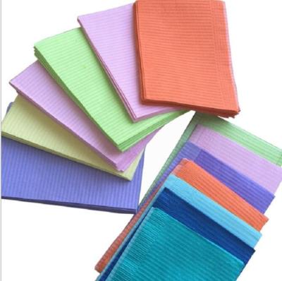 China Clinic Waterproof Disposable Colorful Dental Bibs For Dentist / Medical Use for sale