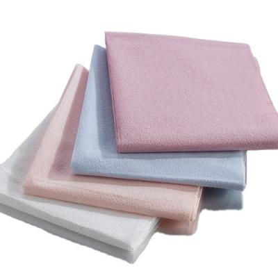 China Original diposable 3 ply PE+tissue paper drape sheet for sale