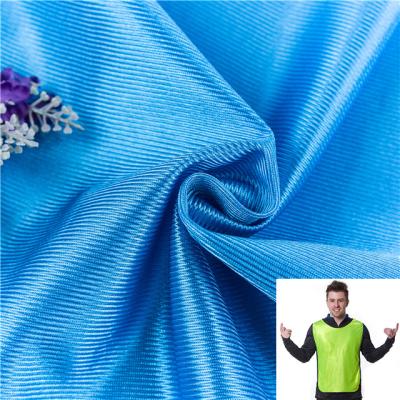 China Chinese factory supply waterproof soft polyester fabric shine fabric for sportswear advertising vest sports training vest for sale