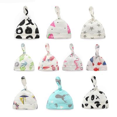 China Picture 0-6 Months Organic Cotton Stretchy Summer Hat Turban Newborn Unisex Knotted Hat Gift For Infant Baby Hospital Beanie Cute for sale