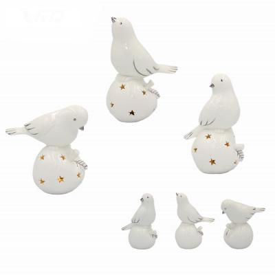 China New design porcelain festival porcelain bird with LED light ceramic design home decoration for sale