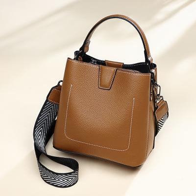 China 100% Eco-friendly /Fashion High Quality\Comfortable\Durable Luxury Genuine Leather Factory Direct Product Handle Shoulder Handbags For Casual Tote Shoulder Bag Button Type ladies for sale