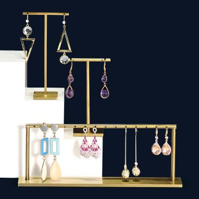 China OEM+ODM+Wholesale Luxury Jewelry Display Stand For Custom Logo Gold And Silver Metal Earring Stand for sale