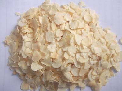 China dehydrated Garlic dried Garlic dry yellow Garlic Flakes for sale