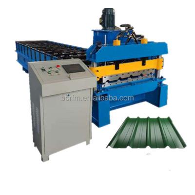 China Construction worksÂ   Tr4 tr5 tr6 trapezoidal roof sheet machine tr4 panel roof forming machine aluzinc roofing maquina for sale