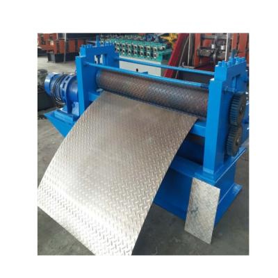 China Construction worksÂ   Factory Price Chinese Aluminum Sheet Metal Steel Embossing Machine for sale