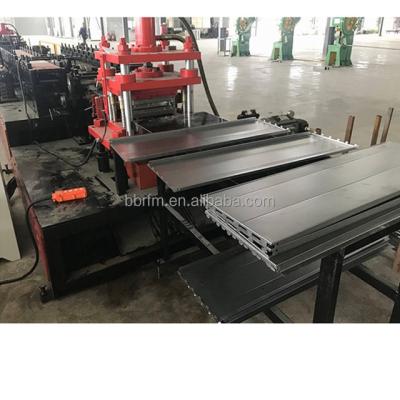 China Construction worksÂ   Storage Warehouse Shelf Production Line Straight Rack Column Roll Forming Machine Equipment for sale