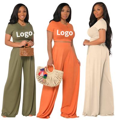 China Wholesale Anti-wrinkle solid color comfortable short sleeve loose crop top and wide leg full length straight pants two piece set for sale