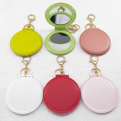 China Promotion Gifts Double Sided Portable Mini Logo Custom PVC Contract Mirror With Key Chain for sale