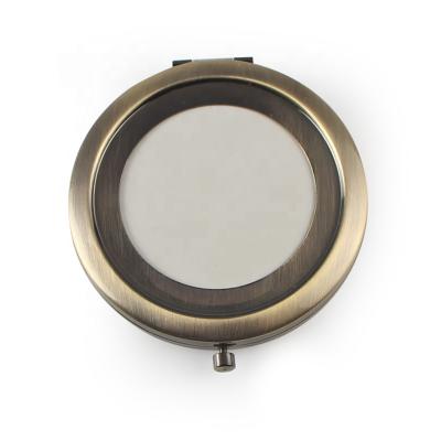 China DIY Blank Sublimation Enlarging Antique Cavity Round Lady Handbag Folding Metal Compact Bronze Mirror for sale