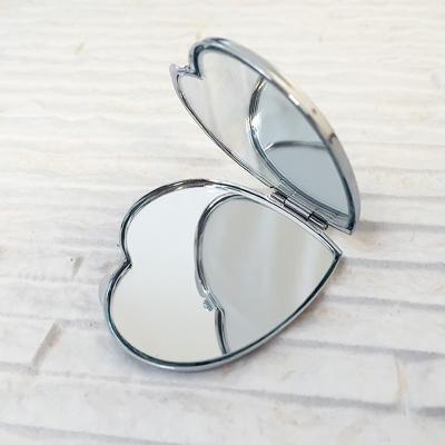 China Magnifying HEART-SHAPED COMPACT MIRROR CHROME PLATED SILVER POCKET MIRROR for sale