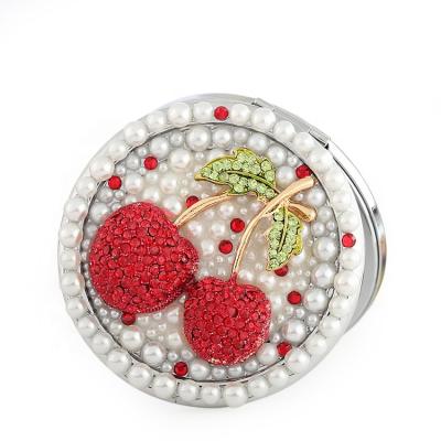 China Compact Bling Crystal Round Pocket Mirror Jeweled Two Sided And Fashion Pearl Folding Mirror for sale