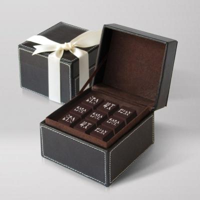 China Recyclable Premium Black Chocolate Compartment Gift Boxes Custom Black Leather Gift Boxes for sale